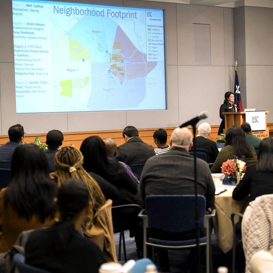 Rushka Tcholakova presenting a neighborhood footprint map to LISC Houston